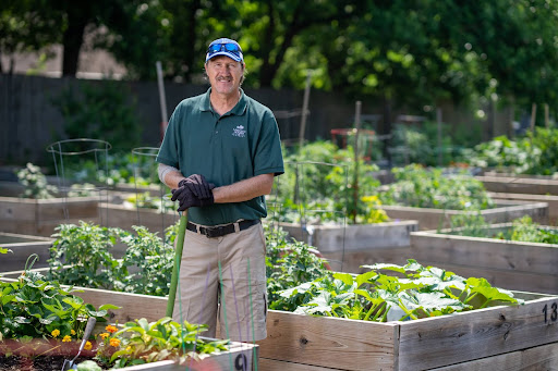 Maintenance Generalist at Masonic Homes Kentucky working in the garden