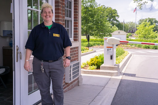 Security Officer at Masonic Homes Kentucky standing by the entryway gate - enneagram